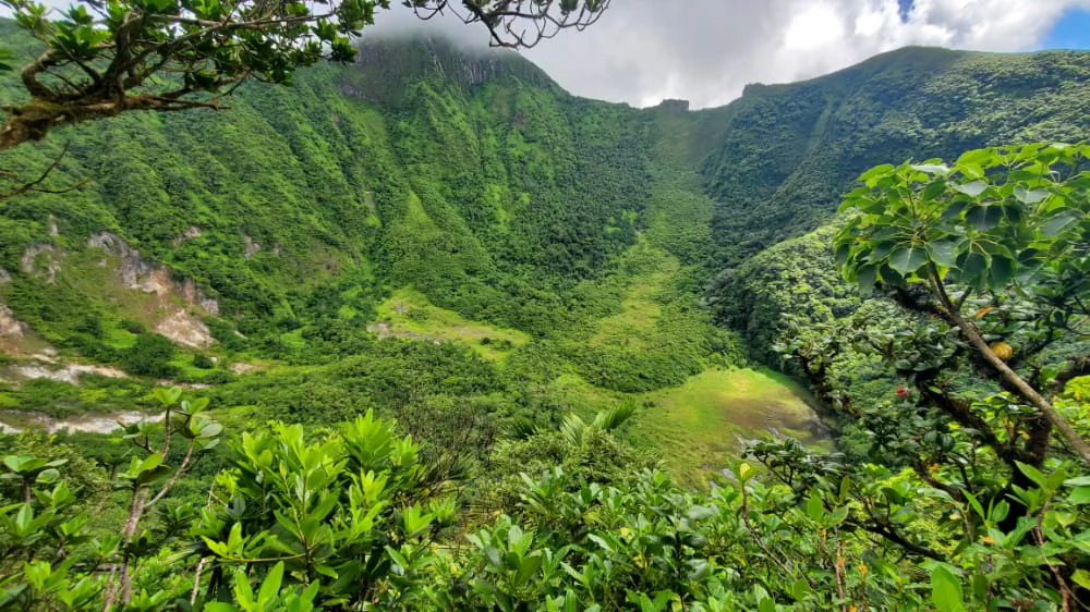 View across the Mount Liamuiga crater and green volcanic slopes in St Kitts